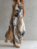 Wells & Monroe Jumpsuit met Halterhals en Ink-Wash Print, Beige