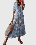 Boho summer dress in blue with diamond ikat pattern, short sleeves, tiered skirt