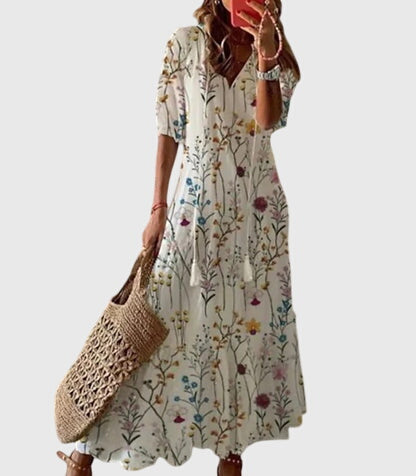 Boho summer dress in cream with red and green botanical print, short sleeves, tiered hem