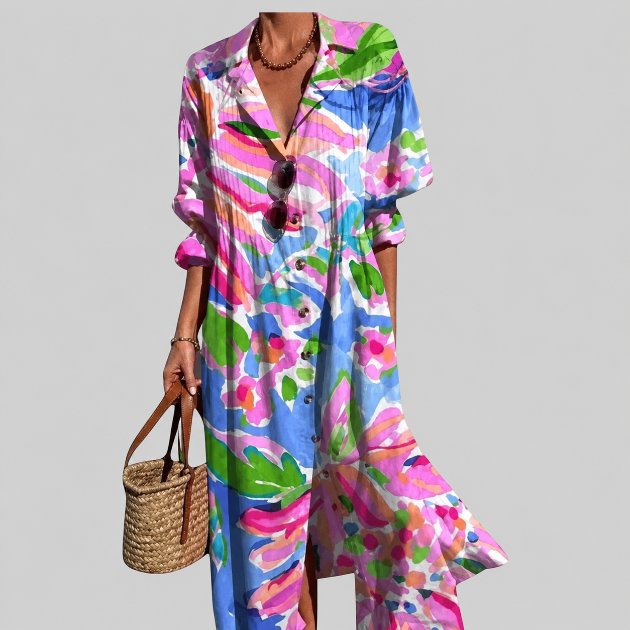 Blue, pink, and green watercolor print boho dress with V-neck and button front.
