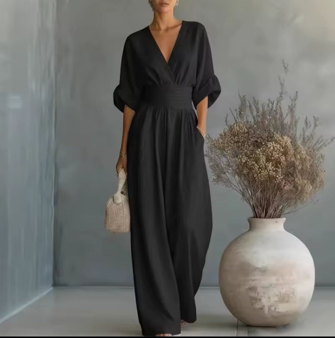 Risel Jumpsuit met Crossover V-hals en Wijde Pijpen